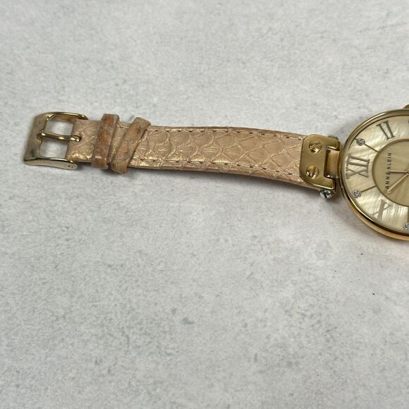 Anne Klein Watch Womens 34mm Round MOP Dial Embossed Band Gold Tone New Battery - Picture 3 of 11
